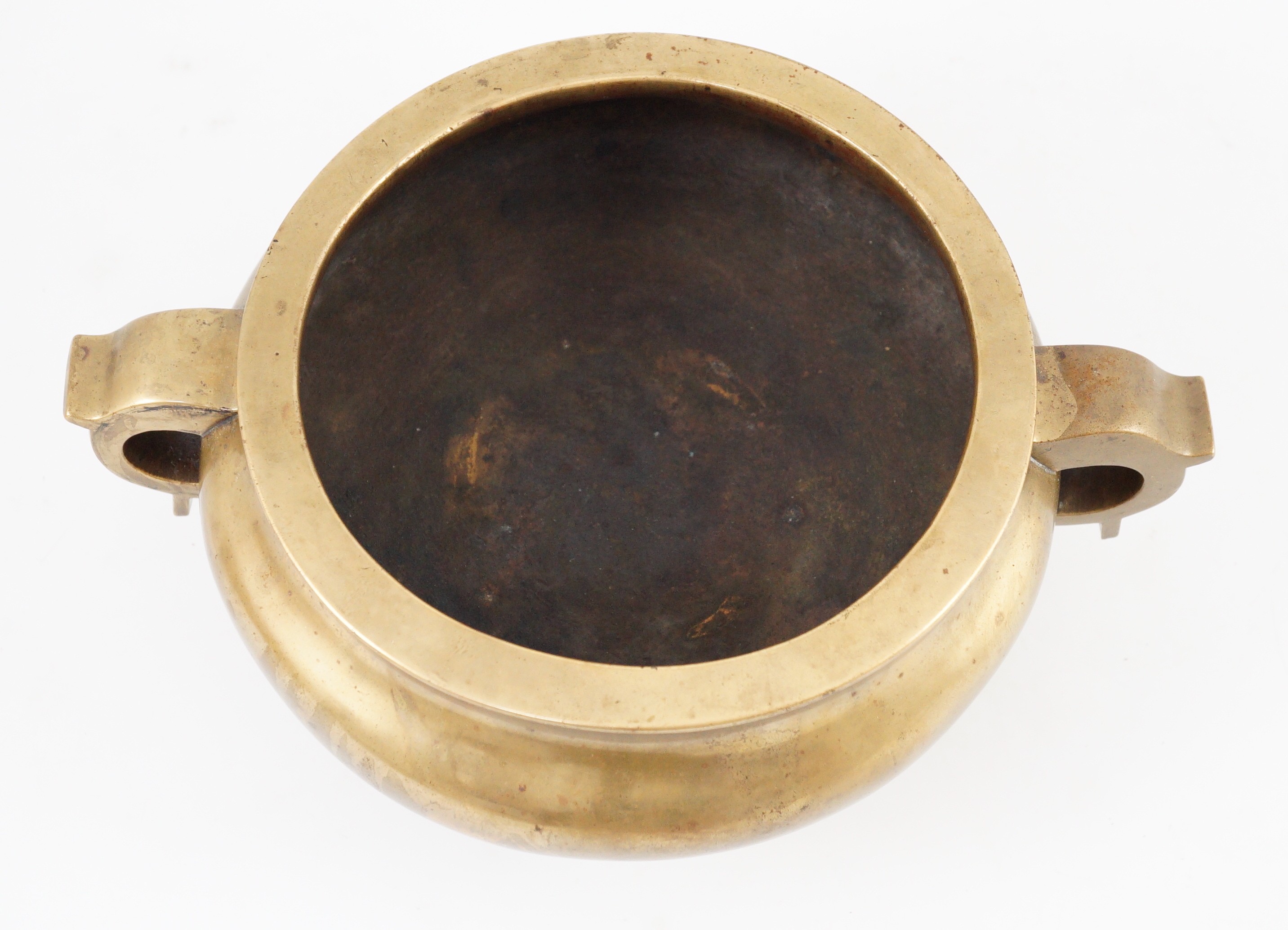 A large Chinese bronze censer, ding, 18th century, with sixteen character Xuande mark, 29cm wide